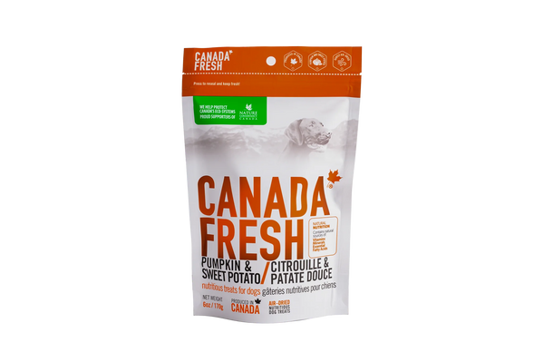 Front view of PetKind Canada Fresh Pumpkin & Sweet Potato Treats bag, showcasing nutritious, air-dried dog treats made with natural ingredients.