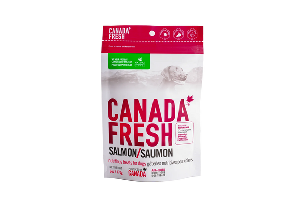 Front view of PetKind Canada Fresh Salmon Treats bag, showcasing nutritious, air-dried salmon dog treats with natural ingredients.