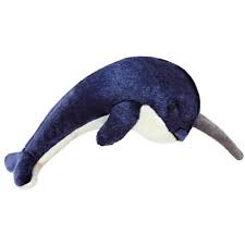 Close-up of Bleu the Narwhal plush dog toy featuring a distinctive narwhal tusk, ultra-soft premium fabric, reinforced Tuffweb™ mesh lining, embroidered safety details, and durable construction designed for carrying, shaking, fetching, and interactive play.