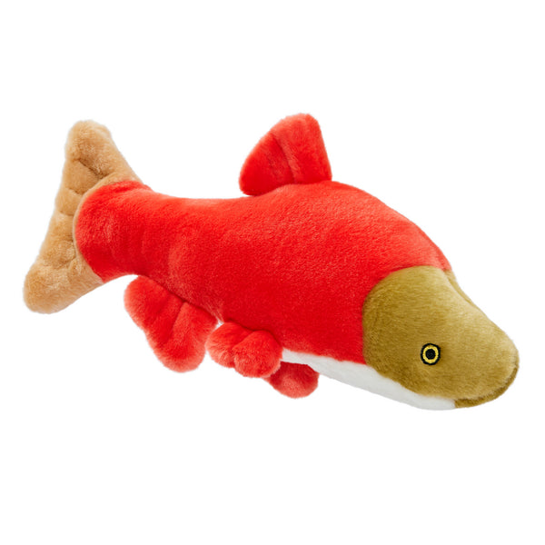 Close-up of Cedar the Salmon plush dog toy featuring bright red premium fabric, realistic fish-inspired details, reinforced Tuffweb™ mesh lining, embroidered safety features, and durable construction designed for fetching, tugging, carrying, and shaking.